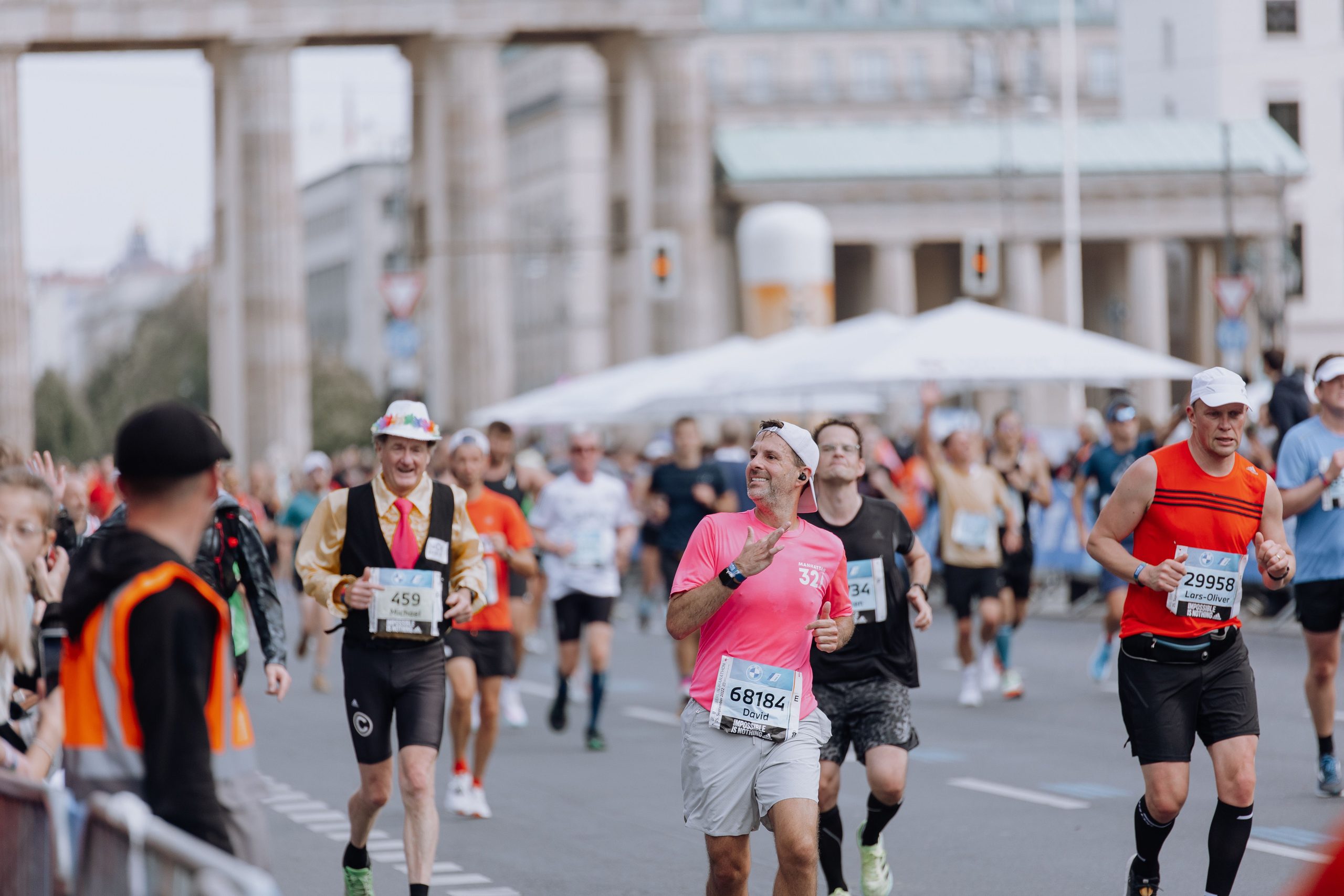 Runners passing the Brandenburg Gate at the Berlin Marathon